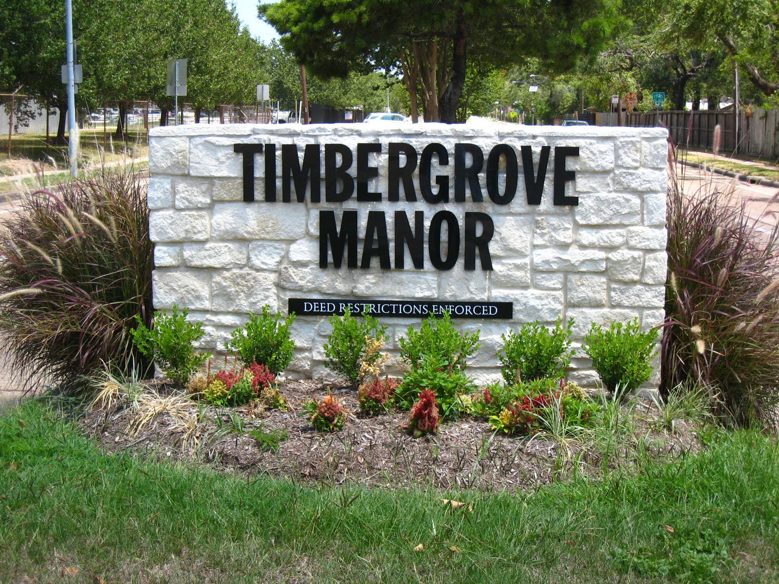 Timbergrove Manor neighborhood entrance sign in Houston
